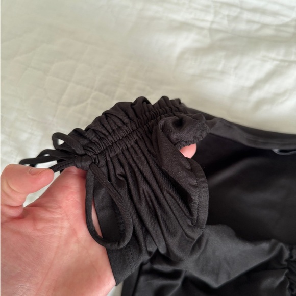 ADIKA Black Size XS short sleeve bodysuit with snap bottom and ruching - Picture 3 of 10